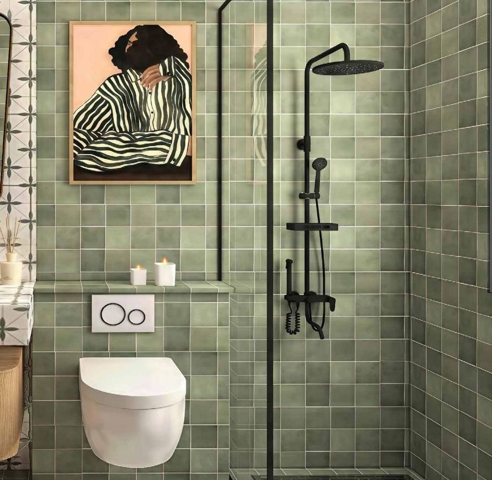 Bathroom with green tiles and black fittings