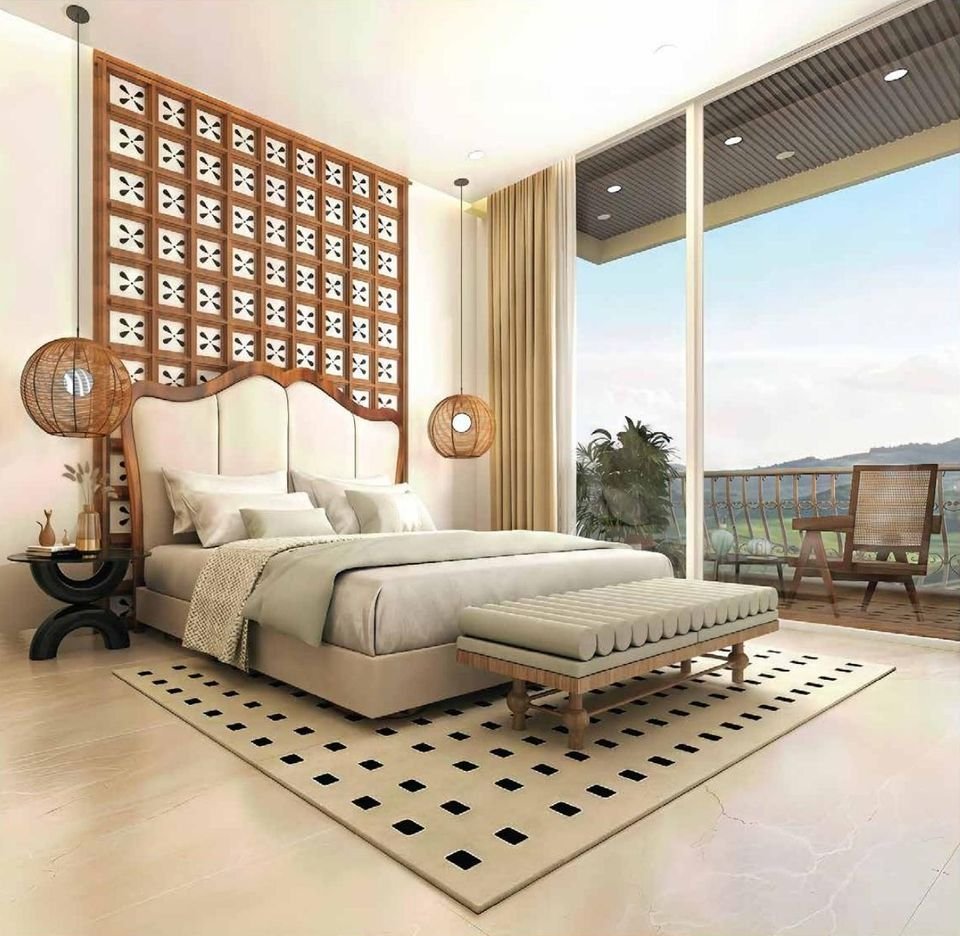 Bedroom with carved headboard wall and balcony